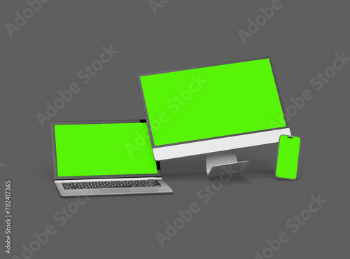 Render of desktop, laptop and smartphone with greenscreen on a dark background