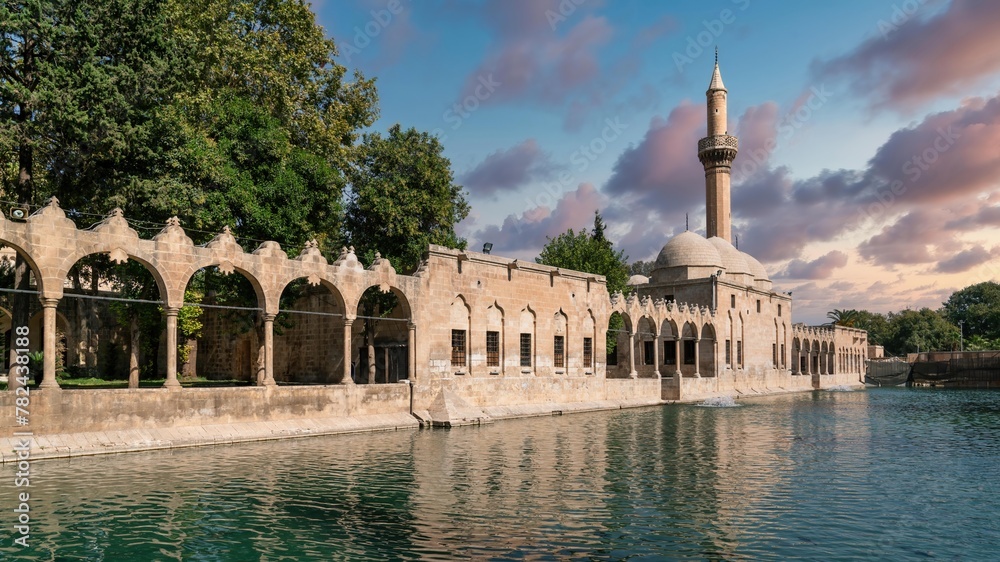 Sanliurfa, Turkey - 14.10.2022: Balikligol fish pond and Halil ur Rahman mosque. This is a sacred site and birth place of prophet abraham