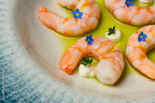 Gourmet meal shrimps in green herb oil © 26max