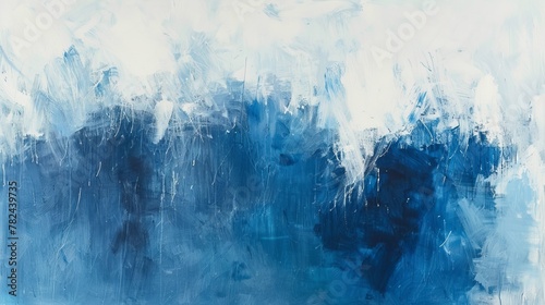 Blue and white acrylic paint creates an abstract and textured composition on canvas. Modern abstract artwork with a minimalist cool-toned color palette. photo