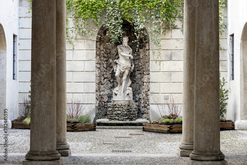 The original statue of Neptune in the courtyard of Trento town hall at Thun Palace. Trentino-Alto Adige, Italy