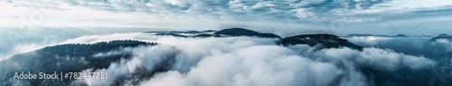 mountain peaks above the clouds.