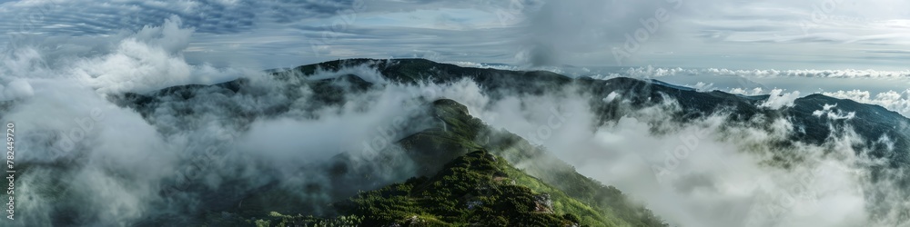 mountain peaks above the clouds.