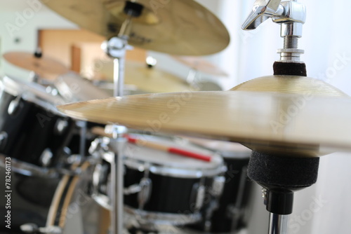 Drums close up, focus on hi-hat cymbal 