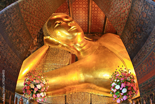 The Long Reclining Buddha (Phra Buddhasaiyas) in Wat Pho, One of the largest Buddha statues in Bangkok. Thailand  photo
