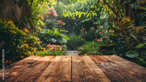 Wooden table in the garden at sunset. Selective focus.