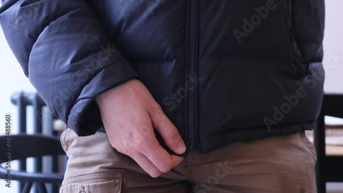 Adult Young Male Teen Doing Up Zip Zipping Up Coat Puffer Jacket Getting Ready