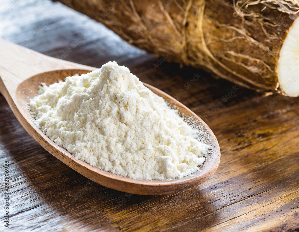 Wooden spoon with manioc flour. Root used in Brazilian cuisine