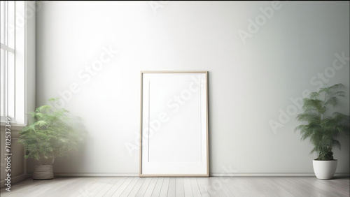 A blank canvas  framed and poised for creativity  adorns a pristine white wall.