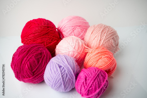 Balls of wool in pink tones