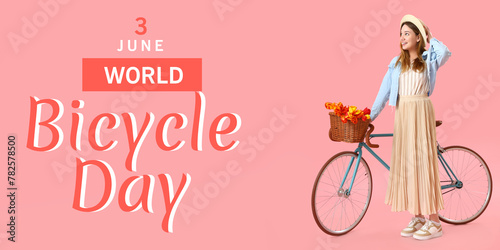 Young woman with bicycle on...
