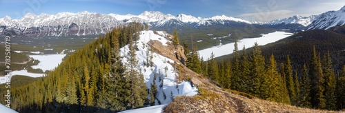Scenic Early Springtime Landscape Panorama, Snow Covered Kananaskis Lakes, Pine Forest Valley, Rocky Mountain Peaks Skyline.  Peter Lougheed Alberta Provincial Park, Canadian Rocky Mountains photo