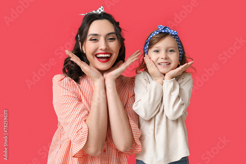 Happy mother and daughter p...