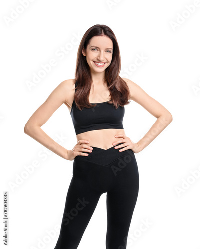 Happy young woman with slim body posing on white background © New Africa