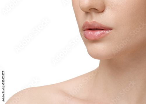 Woman wearing beautiful lip gloss on white background, closeup