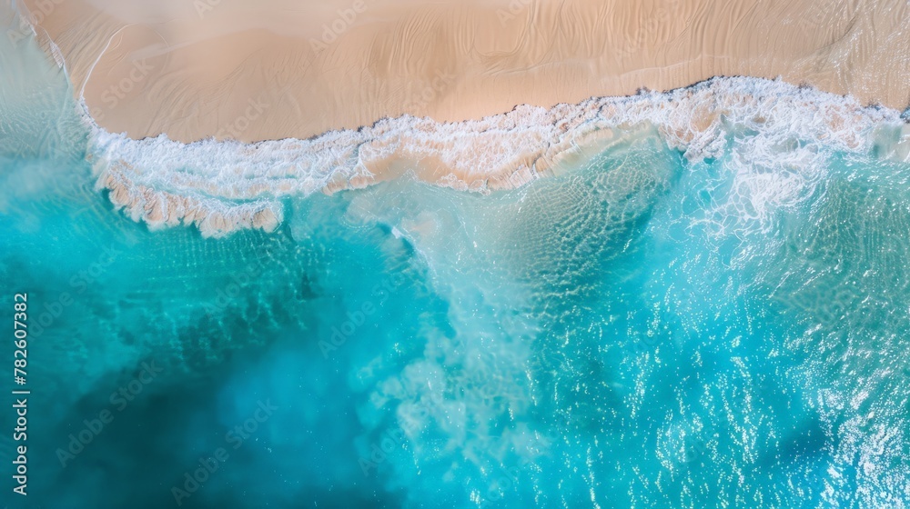 Top view aerial image from drone of an stunning beautiful sea landscape beach with turquoise water with copy space for your text.