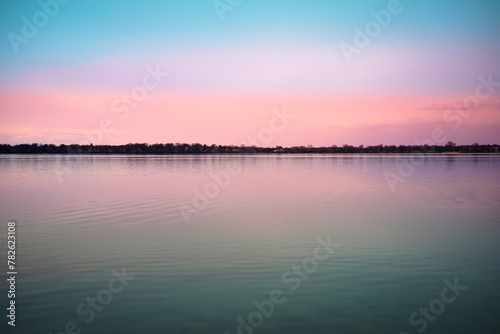 Tranquil relaxing sunset landscape at Schluter Beach in Monona Lake, Dane County, Wisconsin, United States, a suburb of the state capital Madison