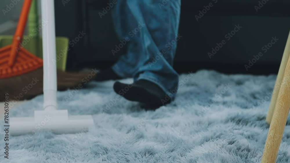 Woman cleaning table using rag and diffuser at home. Woman cleaning table using rag and diffuser at home.