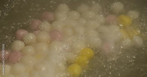 cooking sweet glutinous rice dumplings. Traditional Chinese food in Lantern Festival. slow motion photo