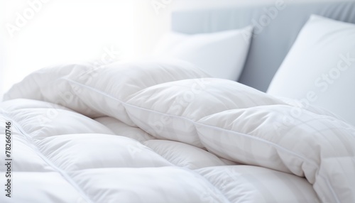 white bed with pillows