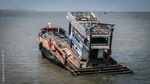 A fishing boat sank in Chonburi Bay near Phli Pier, Chonburi Province, Thailand. photo
