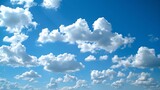 Fantastic soft white clouds drift lazily across a clear blue sky, creating a backdrop of serene beauty. AI Generative