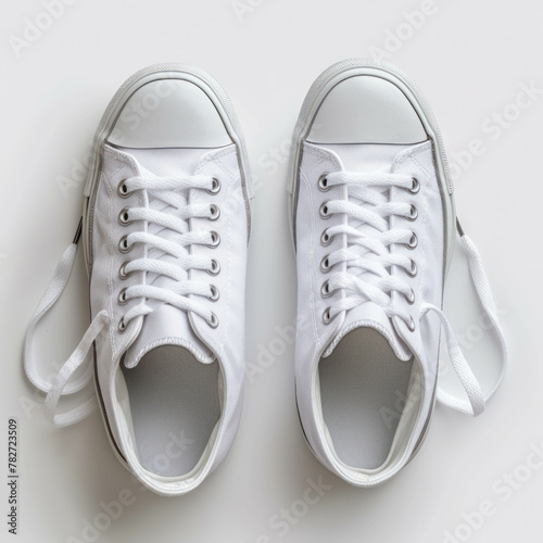 Trendy sneakers displayed against a clean white backdrop, ideal for stylish footwear photography. AI generative technology enriches the minimalist aesthetic. photo