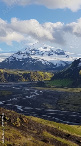 A panoramic view of snow-capped volcanic peaks  glaciers carving their way through the landscape