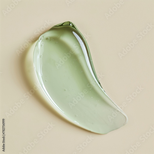 Cosmetic transparent green gel swatch. Natural organic aloe serum. photo