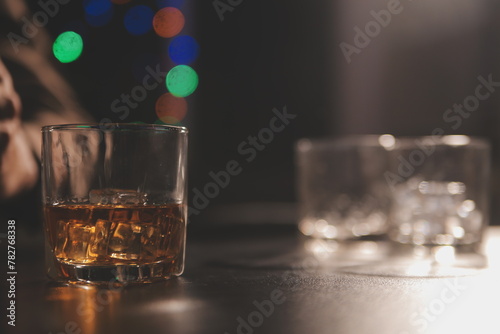 Celebration night  pour whiskey into a glass. Give to friends who come to celebrate