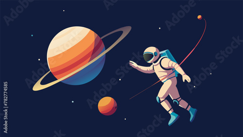 An astronaut floats alongside a planet with a ring system. The astronaut is holding a ball which they release and watch as it becomes caught in