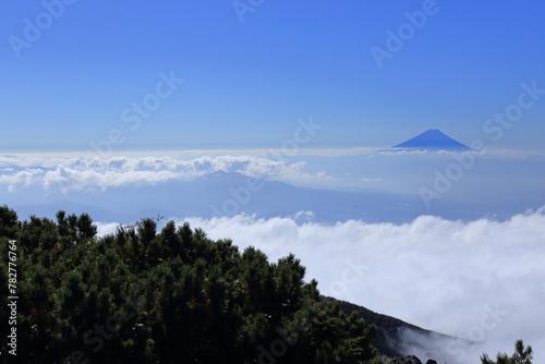 Mt.fuji floating in the sea of clouds seen from the top of Mt.Amigasa photo