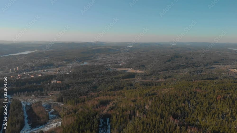Smooth drone 4K shoot over forest in Sweden.