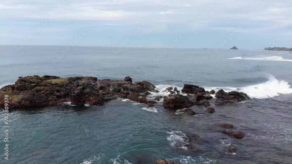 Aerial Drone View of Ocean Waves Crashing on Rocks in Sri Lanka Aerial Drone View of Ocean Waves Crashing on Rocks in Sri Lanka