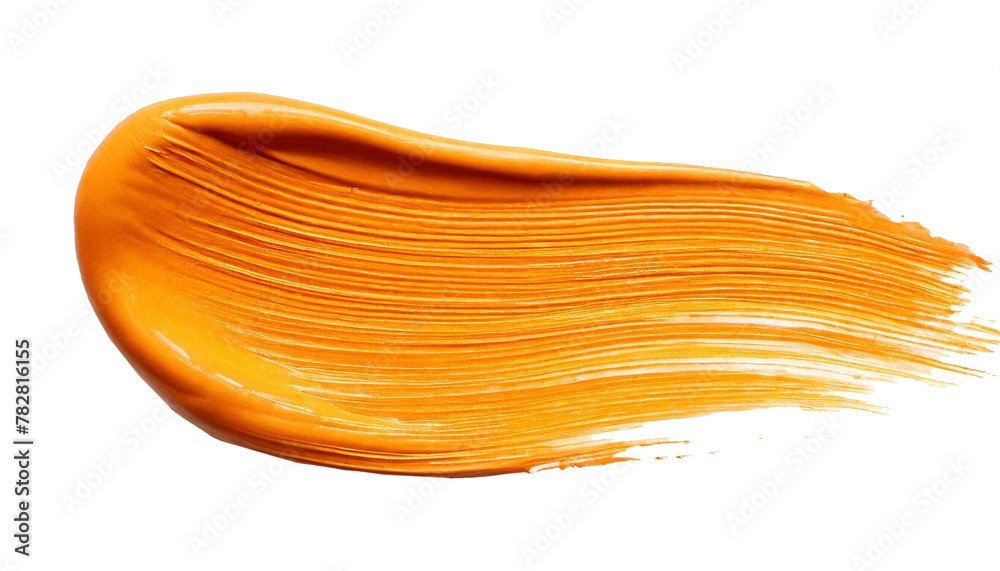 An orange stain applied with a brush, a thick layer of paint isolated on a white background An orange stain applied with a brush, a thick layer of paint isolated on a white background