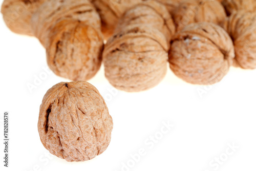 Walnuts are isolated on a white background,
