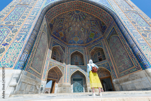 tourist woman in Registan square Samarkand, Uzbekistan photo