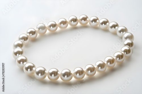 "Elegant Pearl Necklace on White Background"