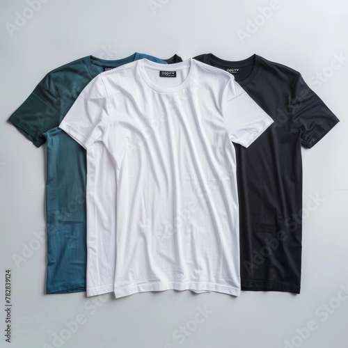 Three folded shirts in a row. © jp