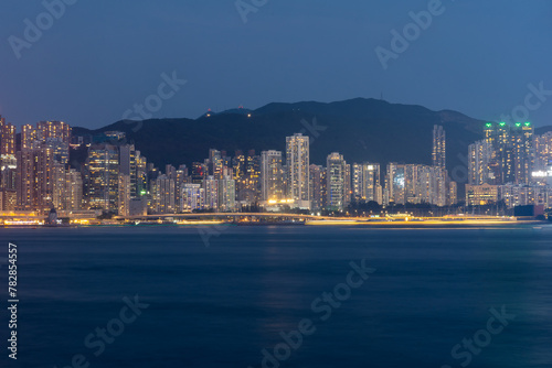 Cityscape of Hongkong Skyline from Victoria Harbour during evening and night in Tsim Sha Tsui   Hongkong   26 March 2024