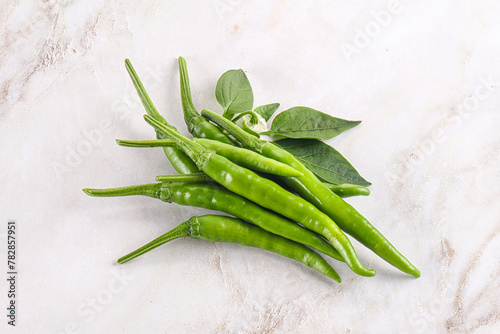 Spicy green chili pepper heap