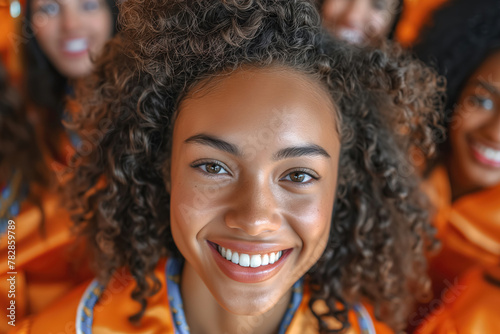 Multiracial graduates smiling closely © Jelena