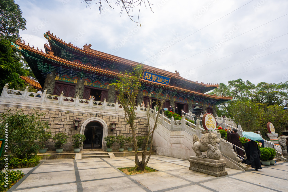 Fototapeta premium Po Lin Monastery , Buddhist Monastery during sunny day in Lantau island at Tung Chung , Hongkong : 28 March 2024