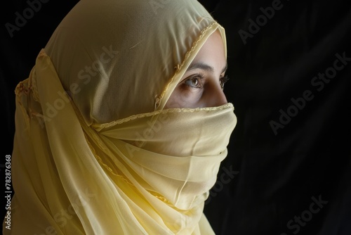 an Arabian woman wearing a yellow Muslim headscarf, also known as a hijab during Ramadan. Fictional Character Created by Generative AI. photo