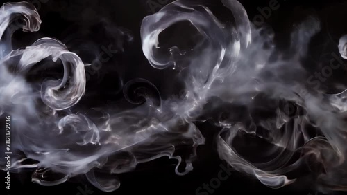 A ghostly sculpture of swirls and curls crafted entirely from mercury vapor glimmers and beckons from the darkness. . . photo