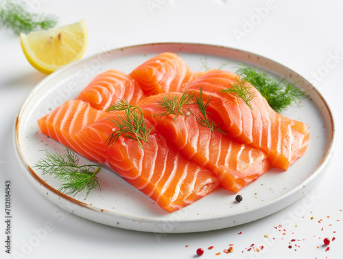 Slice of salmon on a plate isolated on white background. Fresh and raw. 
