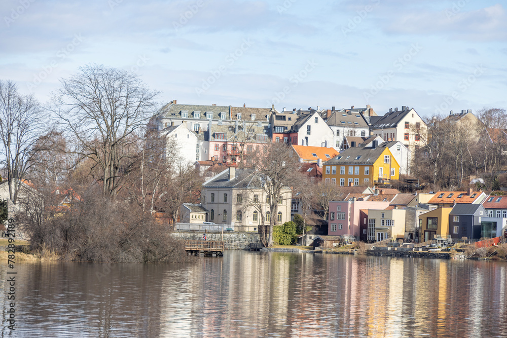 walking along nidelven (river) in a spring mood in trondheim city, trøndelag, nidelven, water, river, landscape, sky, nature, city, reflection, view, trees, clouds, travel, architecture, house, buildi