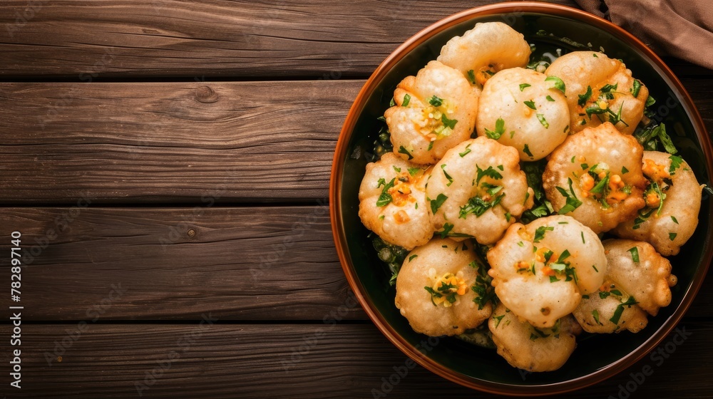 Top view of Mouth Watering Puri Chaat is an Indian snack food which is especially popular in the state of Maharashtra. Top view of Mouth Watering Puri Chaat is an Indian snack food which is especially popular in the state of Maharashtra.
