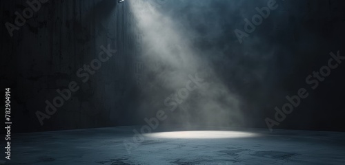 Dramatic Spotlight Illumination on Empty Stage photo