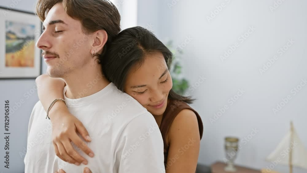 An affectionate embrace depicts love where a man and woman cherish a tender moment indoors. An affectionate embrace depicts love where a man and woman cherish a tender moment indoors.